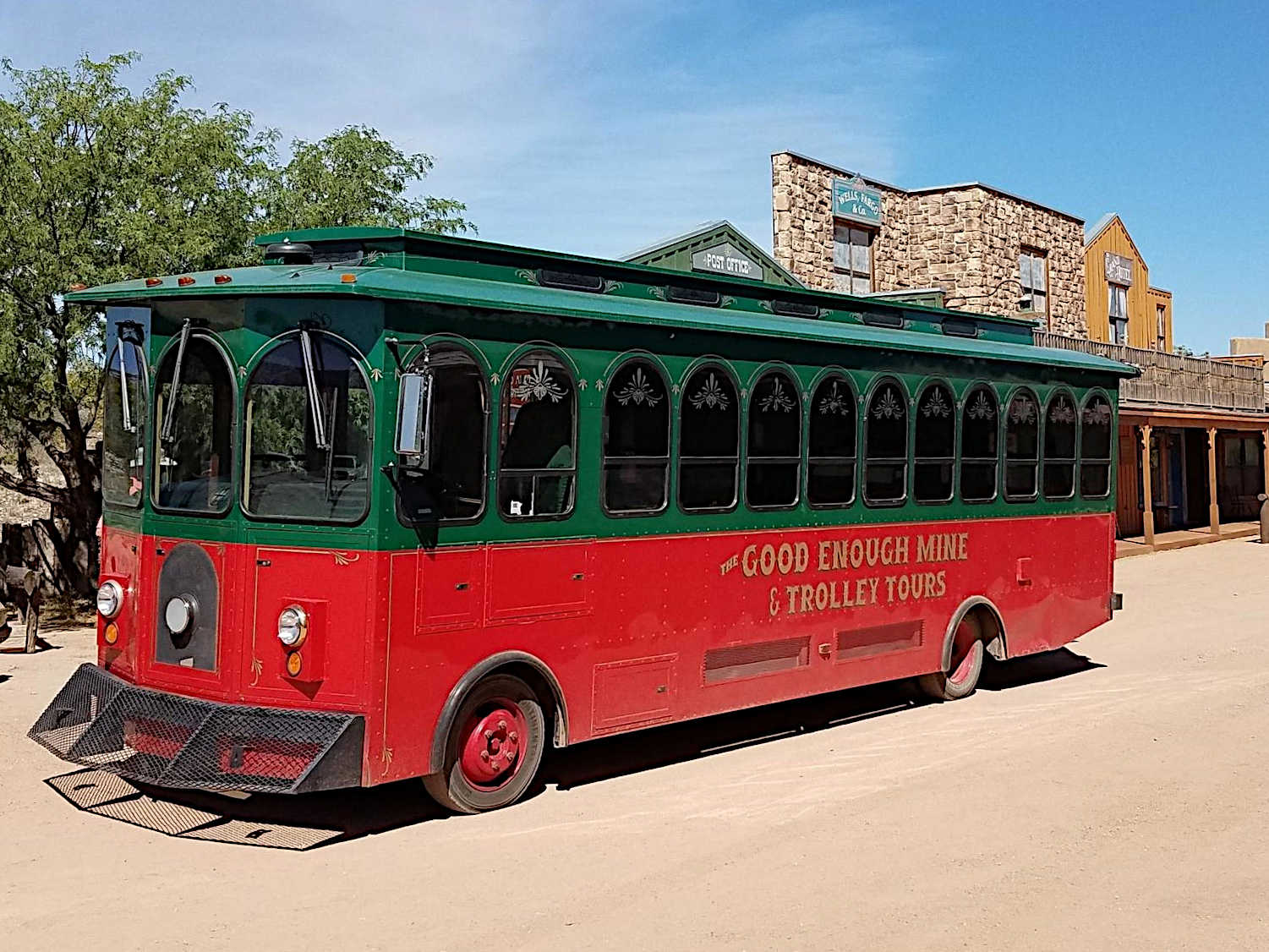 The Good Enough Mine trolley on a Tombstone street, ready to begin the historical tour.